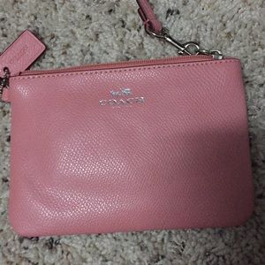 Blush pink coach wristlet